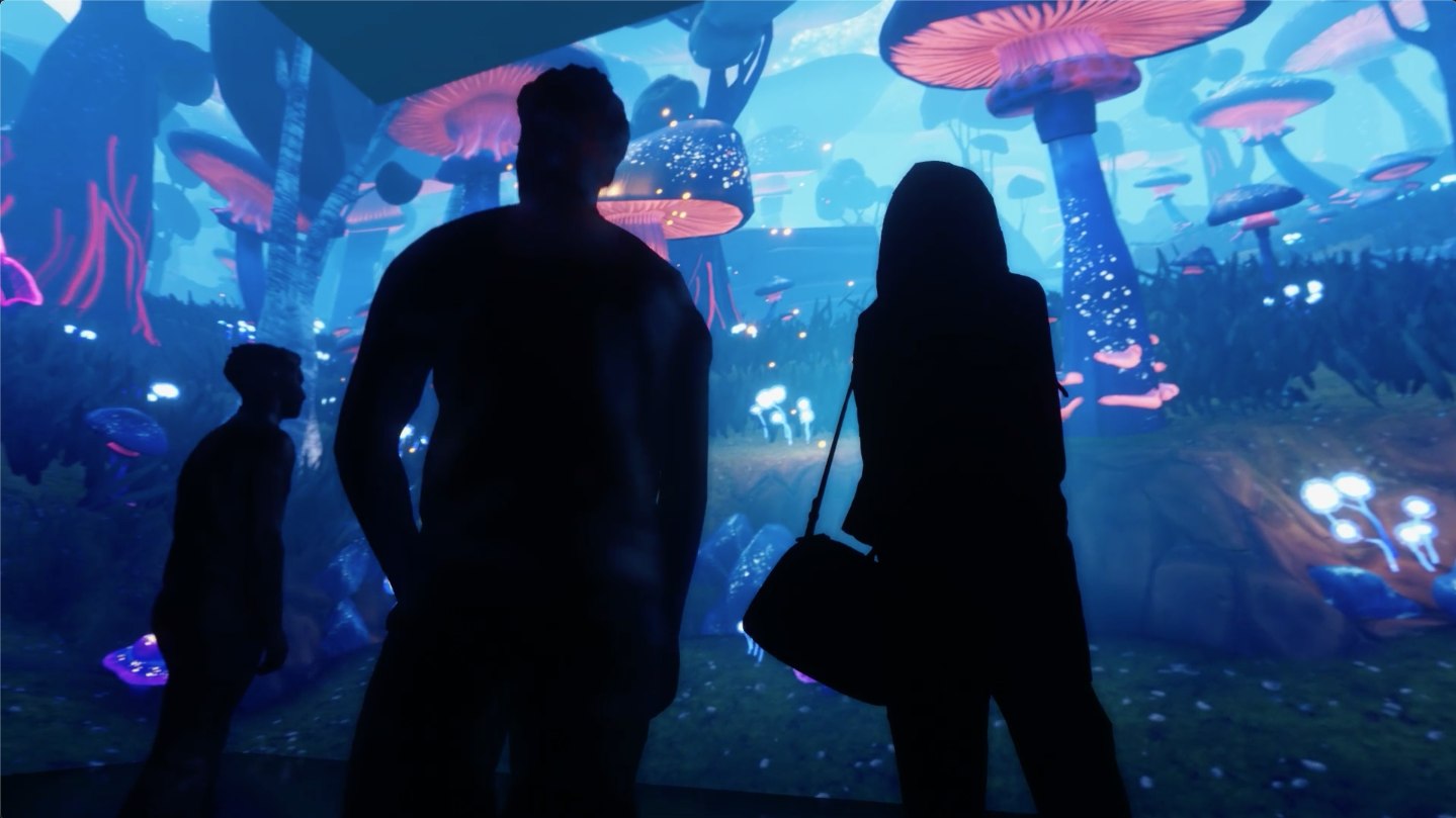 Guests explore a luminous forest of giant mushrooms in Waking Wonderland