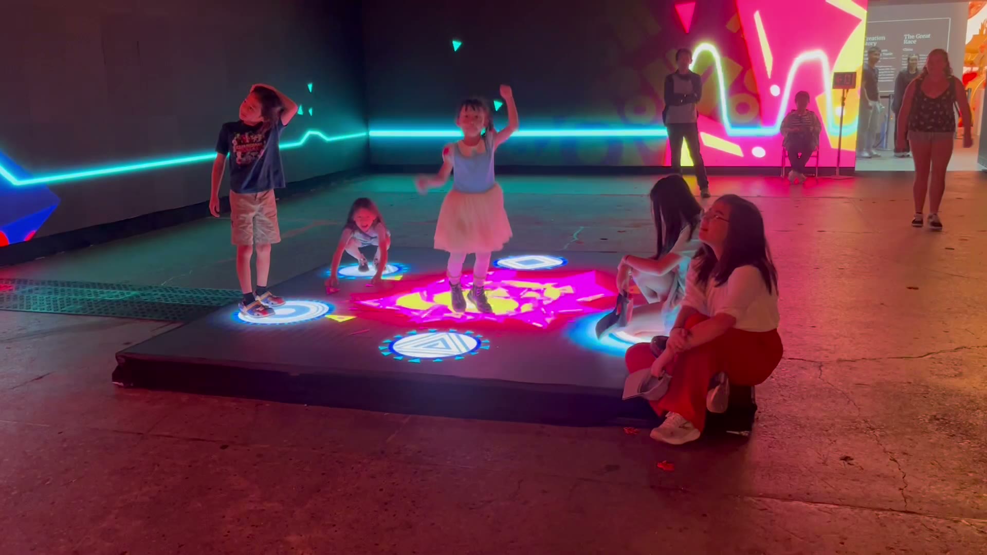 Guests play the interactive drum floor in Oshun's story