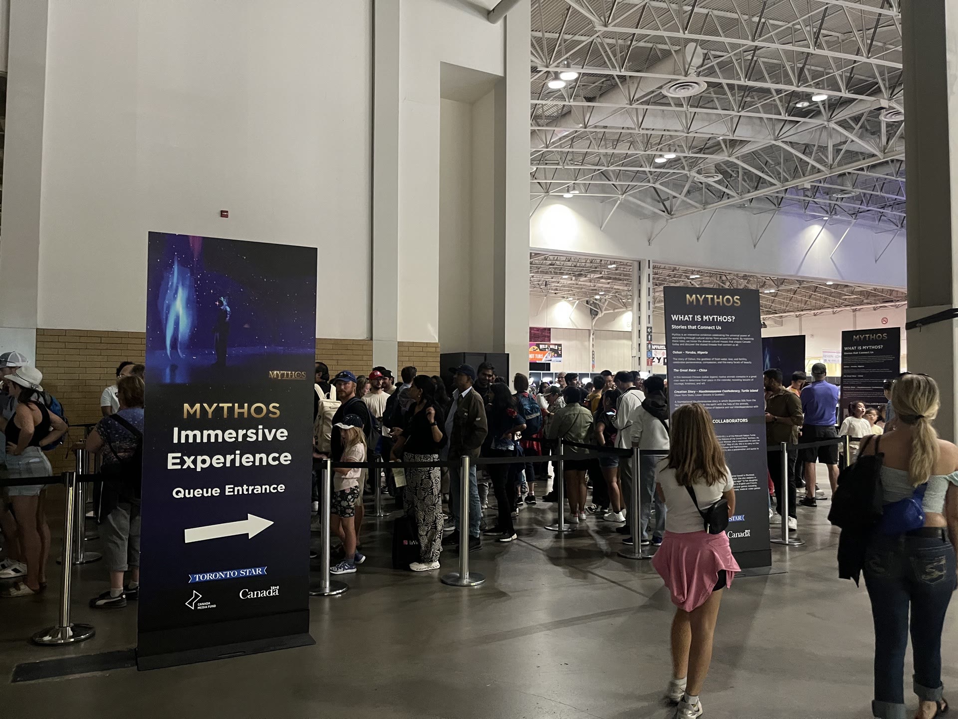 Visitors line up for Mythos at the Canadian National Exhibition