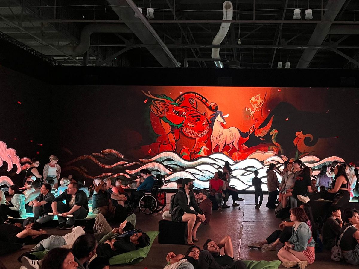 The Great Race story projected across the floor and walls
